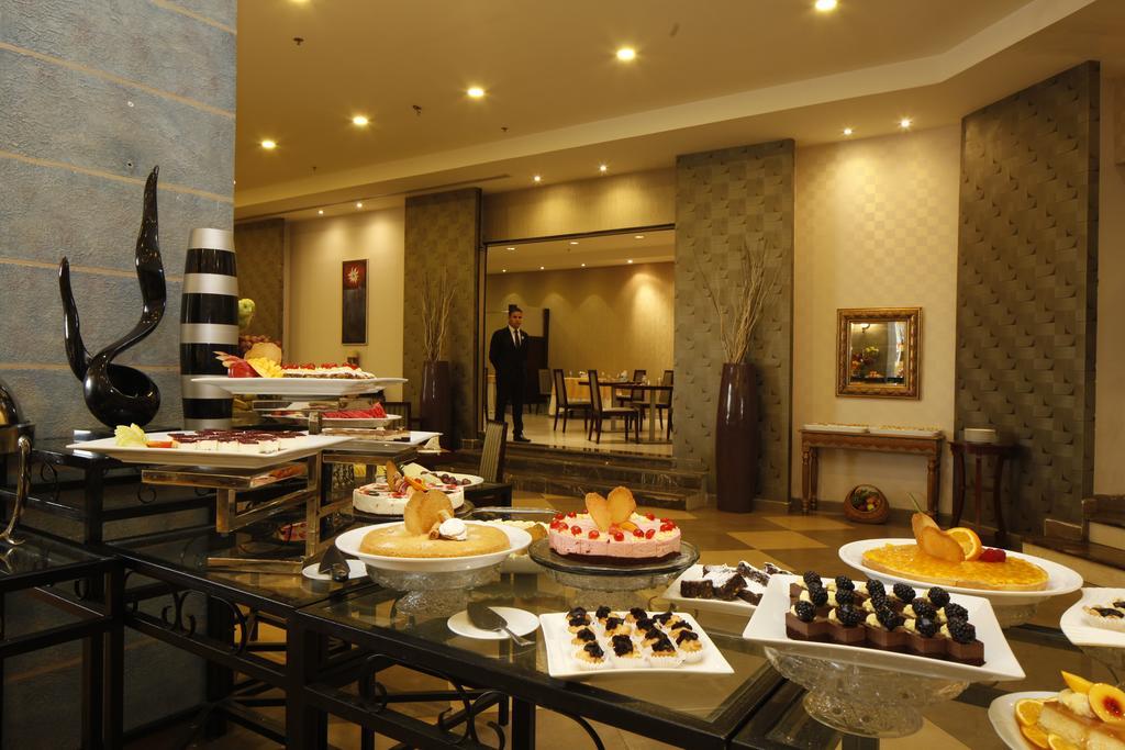 Golden Tulip Hail Екстер'єр фото