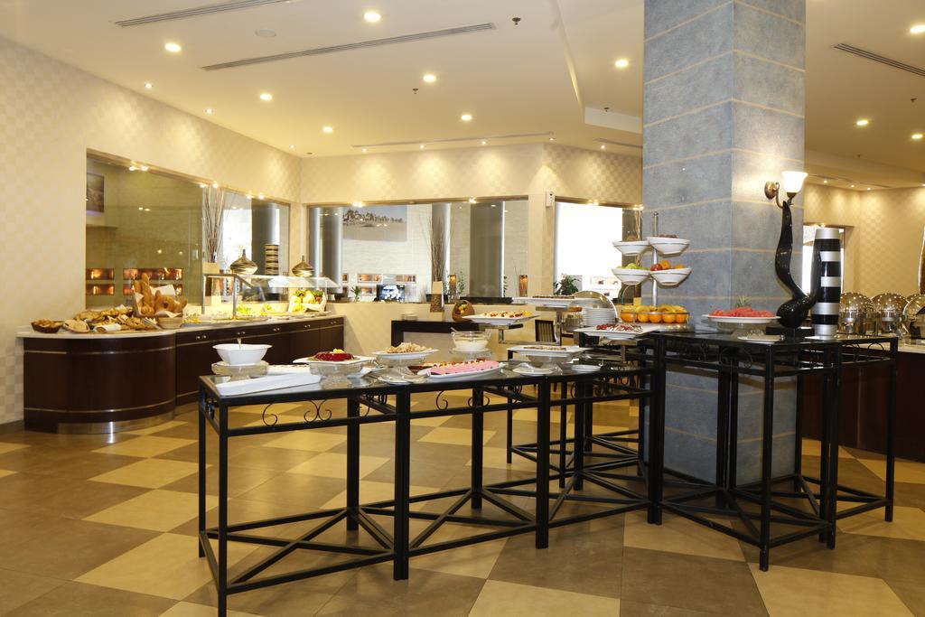 Golden Tulip Hail Екстер'єр фото